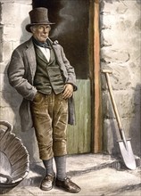 Farmer in Ireland in Sunday outfit, with pipe, Historical, digitally restored reproduction from a