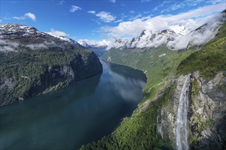 Panorama aerial view of the Geirangerfjord on a sunny spring day, waterfall Gjerdefossen, Norway,