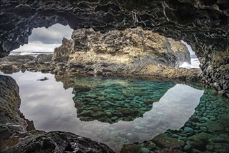 Lava cave with natural swimming pool at Charco Azul, El Hierro, Canary Islands, Spain, Europe