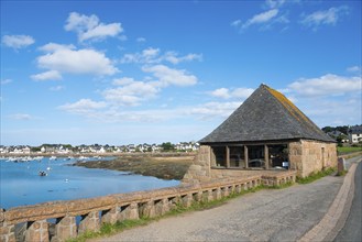 A stone house on the coast under a clear blue sky, Grand Traouïero tidal mill, Moulin à marée du