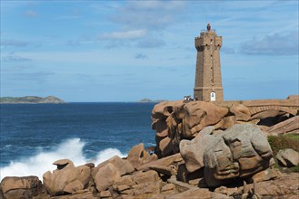 Lighthouse on a rocky shore with breaking waves, Phare de Men Ruz, Ploumanac'h, Ploumanach, Pointe