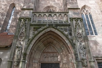 Detail of the entrance portal of St Nicholas and St Ulrich Church, Kirchenberg 15,