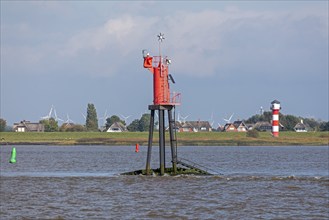 Navigation marks, lighthouse, buoys, thatched roof houses, wind power stations, Glückstadt, Elbe,