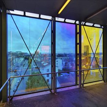 Marollescenece, art installation The Cube, coating of the windows with translucent dichroic films,