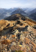 Venet mountain ridge at Kreuzjoch summit, view of Tschirgant summit and the Oberinntal valley, in