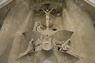 Crucifix, Passion façade, Sagrada Familia, Basilica by Antoni Gaudi, Barcelona, Catalonia, Spain,