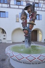 Fool's fountain by Egon Leeuw 1989 in front of the Buchauer, Amtshaus, carnival fountain, fools,