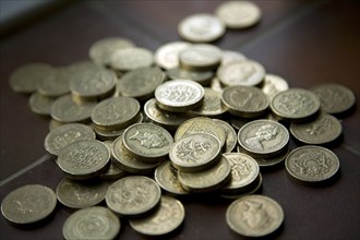 Pile of one pound coins