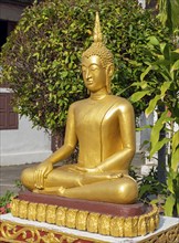 Buddha statue at Wat May Suwannaphumaham Monastery, Luang Prabang, Laos, Asia