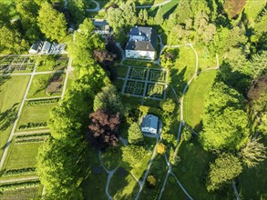 Aerial view of baroniet Rosendal in spring, castle and park, village Rosendal, Rogaland, Norway,