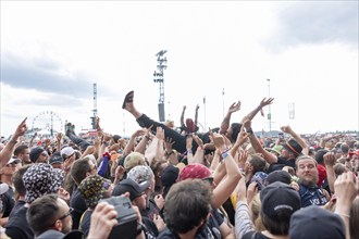 Adenau, Germany, 8 June 2024: Crowdsurfing while Electric Callboy play at Rock am Ring. The