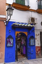 Decorative blue entrance to a boutique, Seville, Andalusia, Spain, Europe