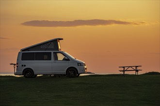 Camper van at the coast, sunset, campsite Fidden, Isle of Mull, Scotland, UK