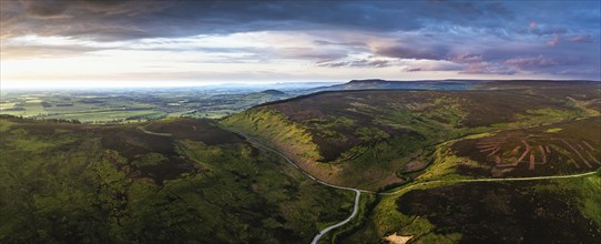 Panorama of Sunset over Cod Beck Reservoir from a drone, North York Moors National Park, North