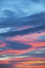 Colourful sunset with blue, pink and purple sky and cloud formations, Baden-Württemberg, Germany,