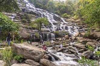 Visitors at Mae Ya waterfall in Doi Inthanon National Park near Chom Thong, Chiang Mai, Thailand,