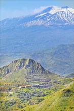 View of mount Etna from Castelmola village, Castelmola, Taormina, Sicily, Italy, Europe