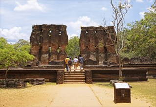 Visitors at the palace of King Parakramabahu in the ruined city of Polonnaruwa, Central Province,