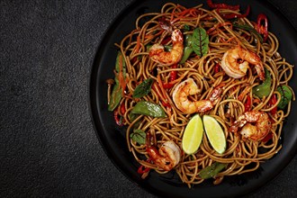 Fried udon noodles with shrimp and vegetables, Asian cuisine, homemade, no people