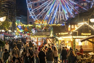 Christmas market in the city centre of Duisburg, Kuhstraße, Königstraße, with Ferris wheel, North