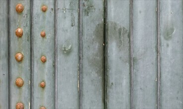 Old wooden gate with metal rivets, background, texture, Apulia, Italy, Europe