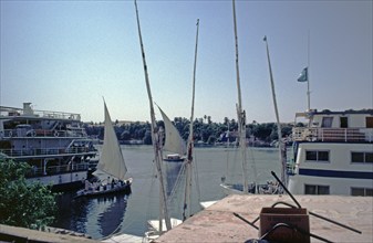 Excursion boats, feluccas, boat harbour, Aswan, Nile Valley, Egypt, September 1989, vintage, retro,