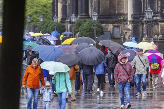 Tourists with umbrellas on the Brühl's Terrace in Dresden, continuous rain in Dresden, Dresden,