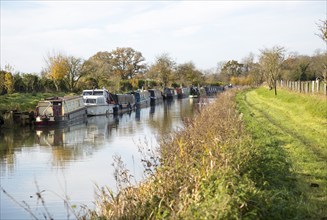 Narrowboats on Kennet and Avon canal, from Ladies bridge, Wilcot, near Woodborough, Wiltshire,