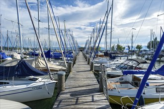 Jetty and sailing boats in Seebruck marina, Seeon, Chiemsee, Chiemgau, Upper Bavaria, Bavaria,