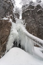 Icy waterfall in gorge, Lainbach Falls, Kochel, Alpine foothills, Upper Bavaria, Bavaria, Germany,