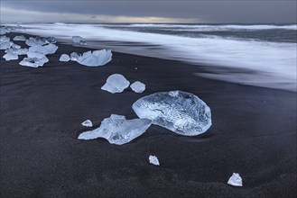 Ice floes, beach, sea, waves, cloudy, Diamond Beach, Breidamerkursandur, Jökulsarlon, Iceland,