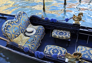 Luxury Gondola waiting for tourists near Rialto Bridge in Venice