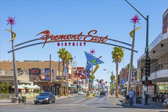 Neon Fremont East District sign on arch over Fremont Street in downtown Las Vegas, Nevada, USA,