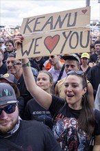 Adenau, Germany, 8 June 2024: A female fan holds up a sign with the inscription: Keanu We Love you