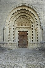 Portal with tympanum of Prieuré Notre-Dame built 12th century, priory, priory, church, abbey,