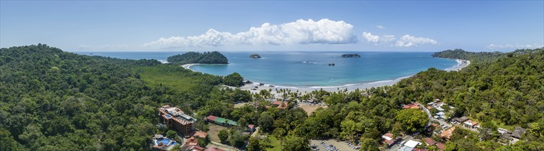 Aerial view, coast and town, Corrohoe Bay and Playa Espadilla, Manuel Antonio National Park,