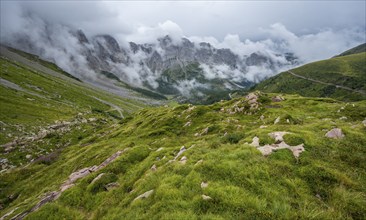 Cloudy rocky mountain peaks Wolayer Köpf and Biegenköpfe, Carnic Alps, Carnic High Trail,