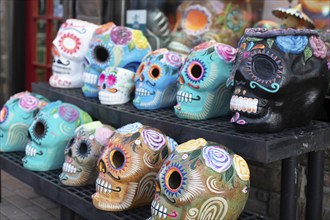 Detroit, Michigan - Day of the Dead skulls on sale outside Xochi's in the Mexicantown neighborhood,