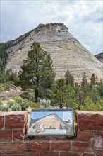 Informative sign explains the rock formations in the Checkerboard Mesa area of Zion National Park,