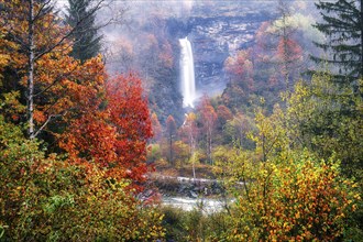 Waterfall in autumn-coloured Verzasca Valley, Canton Ticino, Switzerland, Europe