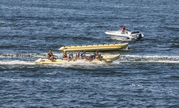 Banana boats and speedboat in Miedzyzdroje, Western Pomerania, Baltic Sea, Poland, East Europe,