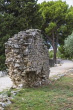 Fragile old stone wall structure at ancient 3rd century Roman ruins of Salona near Solin in late