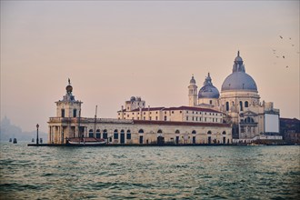 View from 'Colonna di San Marco e San Teodoro' on church 'Basilica di Santa Maria della Salute' on