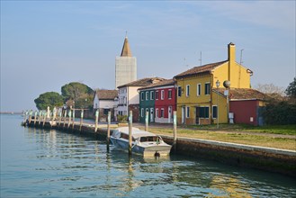 Colorful houses on the coast on the island of Burano, Italy, Europe