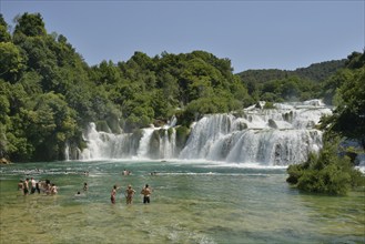 Tourists taking a bath at the Skradinski buk waterfalls, Krka National Park, Šibenik-Knin County,