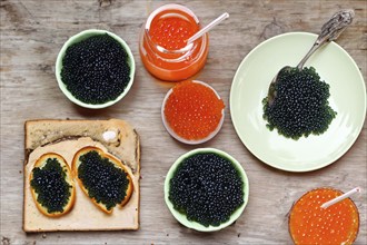 Different kinds of caviar with bread and beverages, AI generated