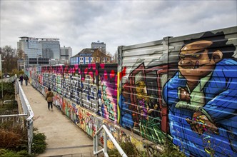 Noise barrier on the A40 motorway, Essen, Graffiti pictures, Essen, North Rhine-Westphalia,