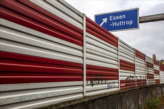 Noise barrier on the A40 motorway, Essen, Graffiti tags, Essen-Huttrop exit, Essen, North