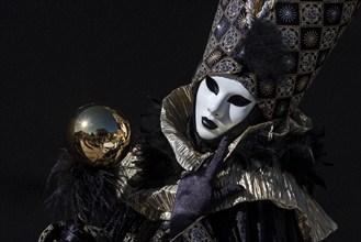 Venetian carnival mask and costume at the Venetian fair on the historic market square, Ludwigsburg,