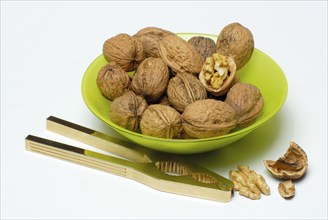 Walnuts (Juglans regia) and nutcrackers, shell